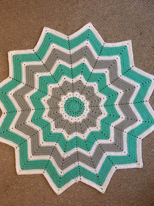 12 pointed star crochet baby blanket.